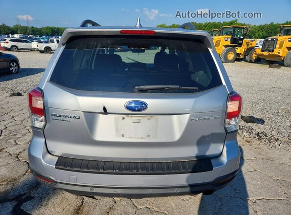 JF2SJARC2JH446888 2018 SUBARU FORESTER Silver Rear view