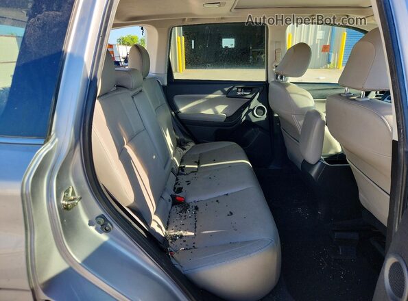 JF2SJARC5HH507838 2017 SUBARU FORESTER Silver Rear interior view