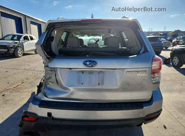 JF2SJARC5HH507838 2017 SUBARU FORESTER Silver Rear view