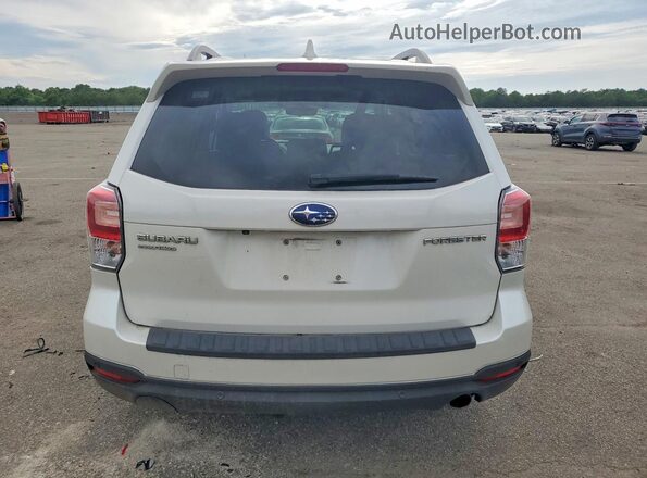 JF2SJARC5JH555328 2018 SUBARU FORESTER White Vista trasera