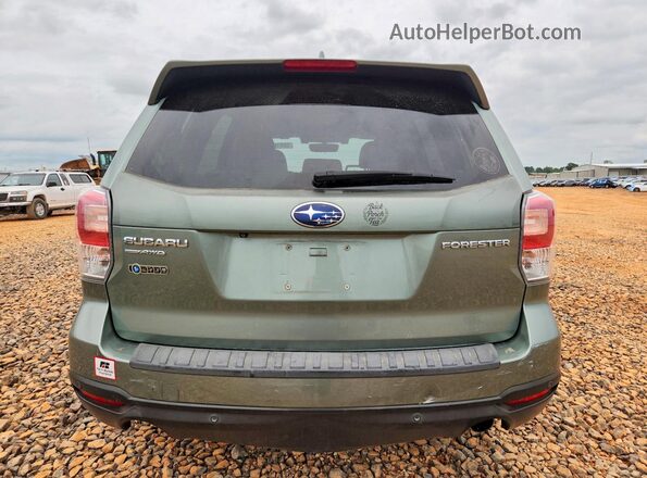 JF2SJARC7HH423438 2017 SUBARU FORESTER Green Rear view