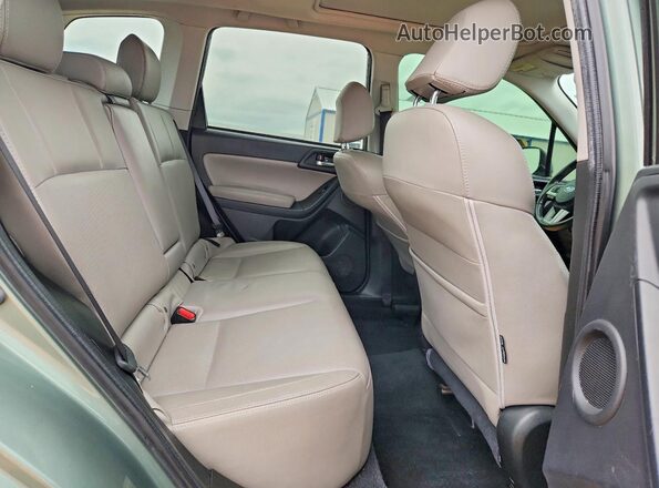 JF2SJARC7HH423438 2017 SUBARU FORESTER Green Rear interior view