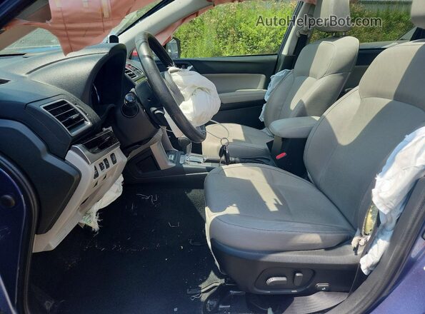JF2SJARC9JH592141 2018 SUBARU FORESTER Blue Vista interior delantera