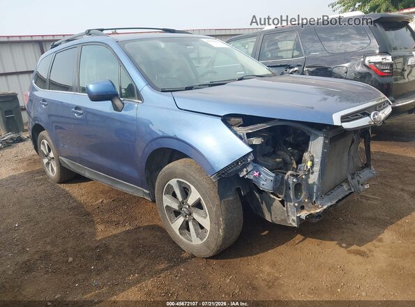 JF2SJARCXJH518436 2018 SUBARU FORESTER Light Blue Widok wnętrza z tyłu