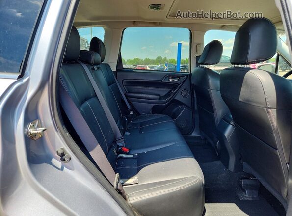 JF2SJATC6HH497054 2017 SUBARU FORESTER Silver Rear interior view