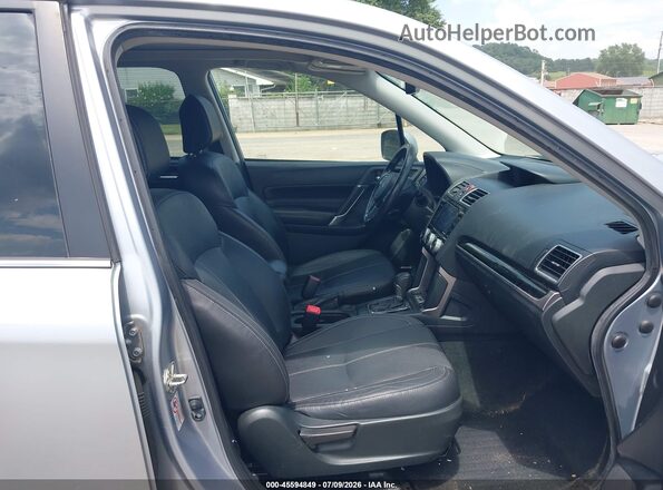 JF2SJATC9HH587900 2017 SUBARU FORESTER Silver Front interior view