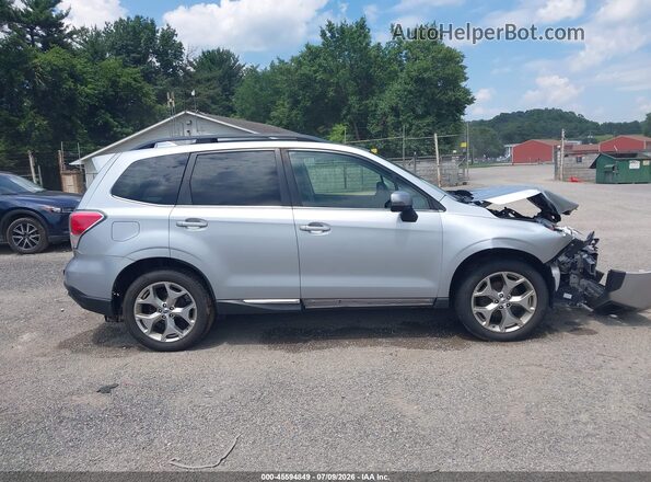 JF2SJATC9HH587900 2017 SUBARU FORESTER Silver Rear interior view