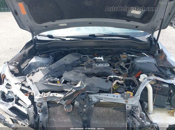 JF2SJATC9HH587900 2017 SUBARU FORESTER Silver Rear view