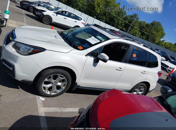 JF2SJAWC5HH574198 2017 SUBARU FORESTER White Rear interior view