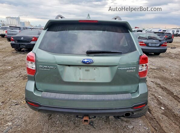 JF2SJAXC5GH515018 2016 SUBARU FORESTER Green Vista trasera