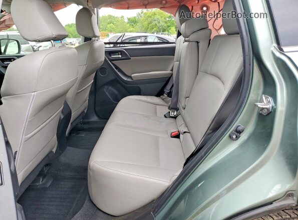 JF2SJAXC5GH515018 2016 SUBARU FORESTER Green Vista interior trasera