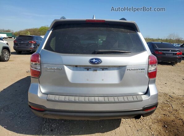 JF2SJAXC9GH536938 2016 SUBARU FORESTER Silver Vista trasera