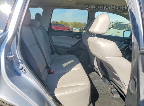 JF2SJAXC9GH536938 2016 SUBARU FORESTER Silver Vista interior trasera