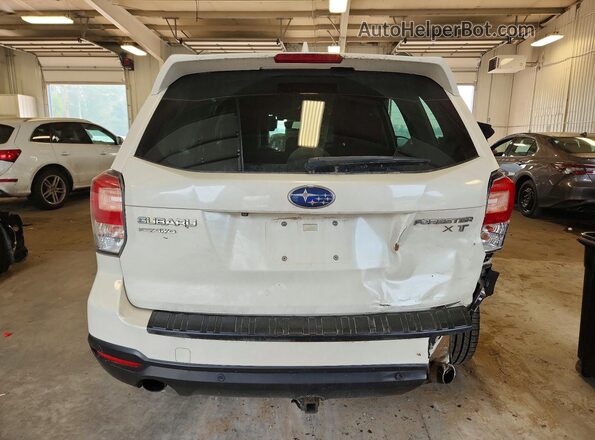 JF2SJGWC0JH458593 2018 SUBARU FORESTER White Rear view