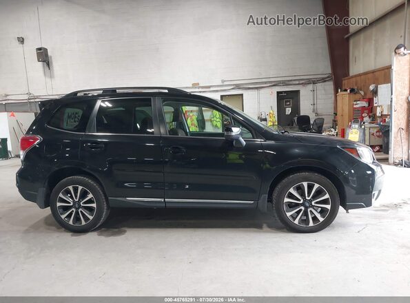 JF2SJGWC8HH566163 2017 SUBARU FORESTER Black Rear interior view