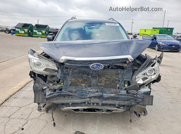 JF2SJGWC8JH596432 2018 SUBARU FORESTER Blue Front view