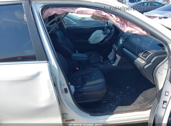 JF2SJGXC9GH504624 2016 SUBARU FORESTER White Front interior view