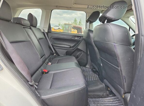 JF2SJHDC0GH403403 2016 SUBARU FORESTER White Rear interior view