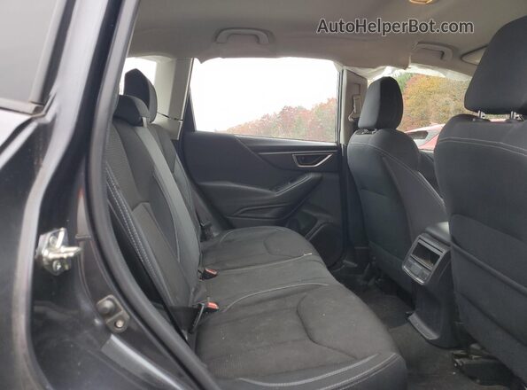 JF2SKACC2KH513559 2019 SUBARU FORESTER Gray Rear interior view