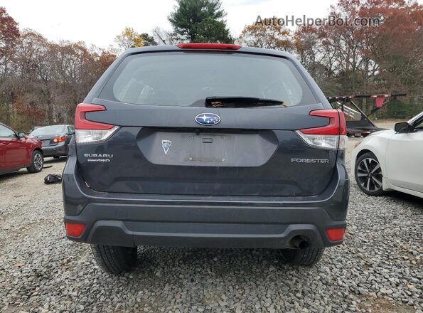 JF2SKACC2KH513559 2019 SUBARU FORESTER Gray Rear view
