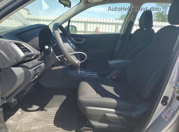 JF2SKACC9KH489034 2019 SUBARU FORESTER Silver Vista interior delantera