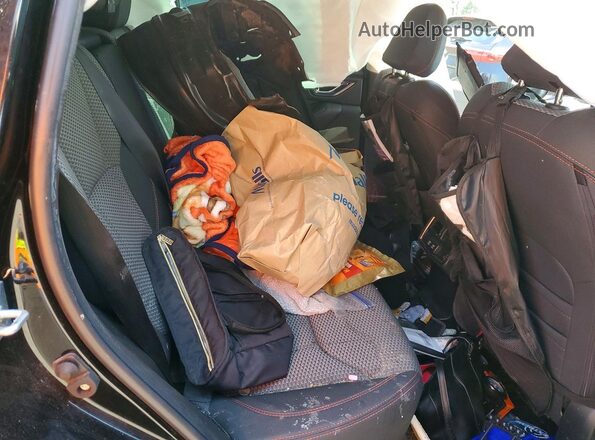 JF2SKAGC1RH416633 2024 SUBARU FORESTER Black Rear seats view