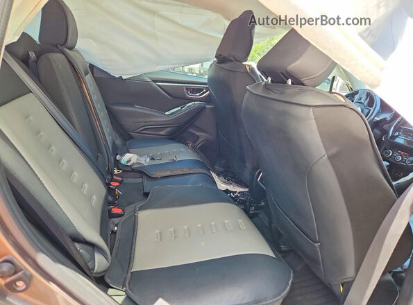 JF2SKAJC4MH556290 2021 SUBARU FORESTER Gold Widok wnętrza z tyłu