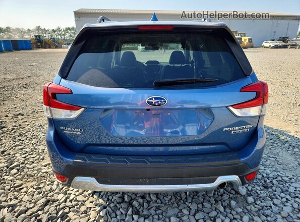 JF2SKAXC8MH437861 2021 SUBARU FORESTER Blue Rear view