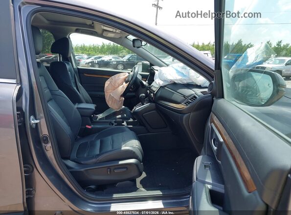 JHLRW2H82KX014202 2019 HONDA CR-V Silver წინა სალონის ხედი