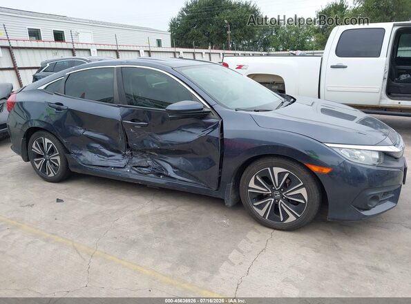 JHMFC1F32JX025580 2018 HONDA CIVIC Gray Rear interior view