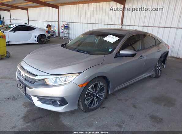 JHMFC1F74JX008458 2018 HONDA CIVIC Silver Vista tres cuartos delantera izquierda