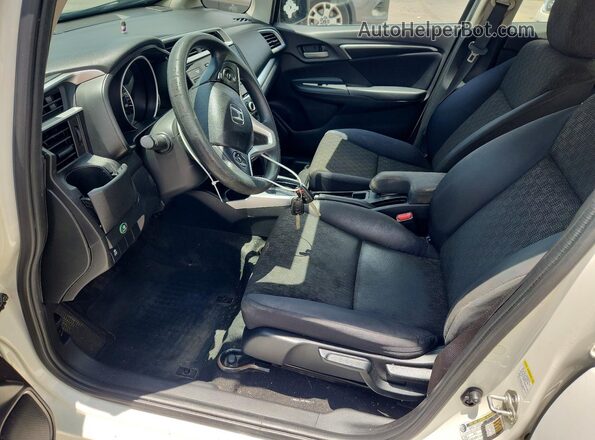 JHMGK5H54GS002420 2016 HONDA FIT White Front interior view
