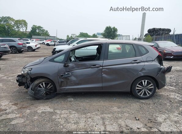 JHMGK5H9XGS014638 2016 HONDA FIT Gray Սալոնի հետևի տեսք