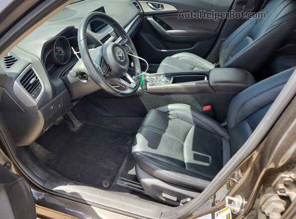 JM1BN1V77H1103377 2017 MAZDA 3 Charcoal Front interior view