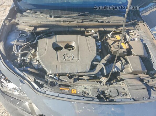 JM1BPBLM1R1717853 2024 MAZDA 3 Blue Սալոնի հետևի տեսք