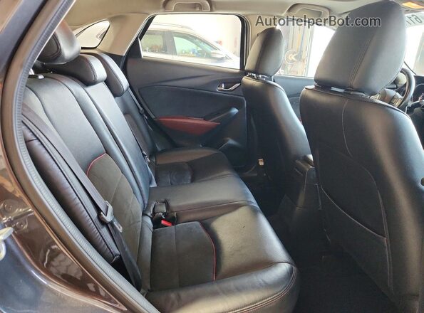 JM1DKBD73G0113174 2016 MAZDA CX-3 Gray Vista interior trasera