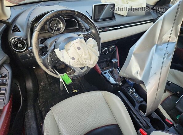 JM1DKBD74G0102832 2016 MAZDA CX-3 Red Widok deski rozdzielczej