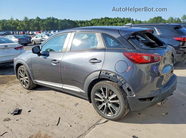 JM1DKBD74G0107612 2016 MAZDA CX-3 Charcoal Trasero izquierdo