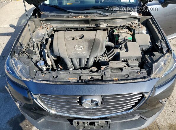 JM1DKBD74G0107612 2016 MAZDA CX-3 Charcoal Vista interior trasera