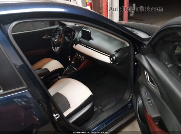 JM1DKBD78G0121268 2016 MAZDA CX-3 Blue Vista interior delantera