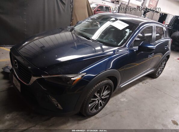 JM1DKBD78G0121268 2016 MAZDA CX-3 Blue Vista tres cuartos delantera izquierda