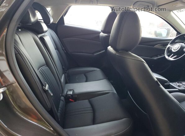 JM1DKDC71K1406331 2019 MAZDA CX-3 Gray Rear seats view