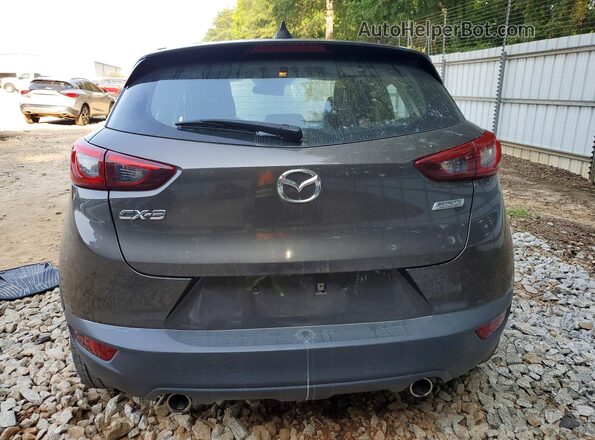 JM1DKDC71K1406331 2019 MAZDA CX-3 Gray Rear view