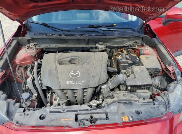 JM1DKDC72H0147024 2017 MAZDA CX-3 Red Widok wnętrza z tyłu