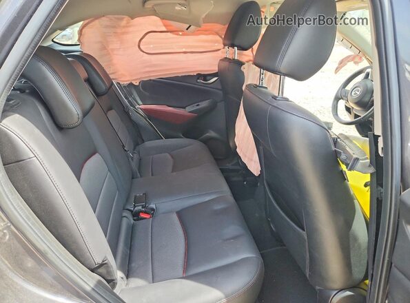 JM1DKDC72H0166804 2017 MAZDA CX-3 Серый Вид задней части салона