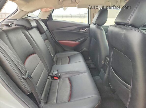 JM1DKDC73H0150739 2017 MAZDA CX-3 Серый Вид задней части салона