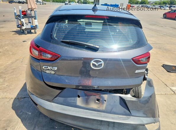 JM1DKDC74H0179926 2017 MAZDA CX-3 Gray Vista trasera