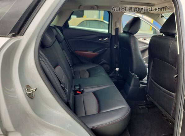 JM1DKDC79G0140957 2016 MAZDA CX-3 Серый Вид задней части салона