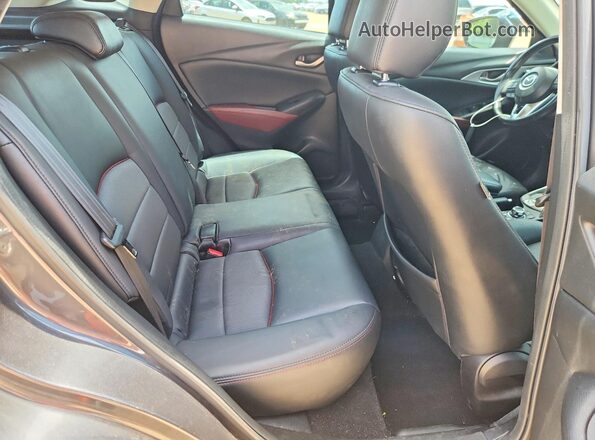 JM1DKDC79H0158411 2017 MAZDA CX-3 Серый Вид задних сидений