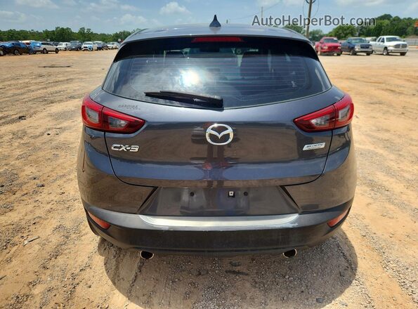 JM1DKDC79H0158411 2017 MAZDA CX-3 Серый Вид сзади